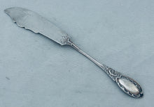 Load image into Gallery viewer, Beautifully Decorated English Sterling Butter Knife, Levesley Brothers, Sheffield, 1908
