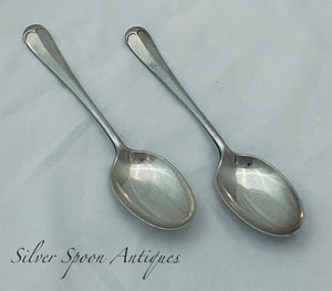 Pair of English Sterling Rat-tail Dessert Spoons, Sheffield, 1930