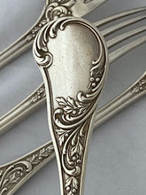 Load image into Gallery viewer, Set of four French silver Neo-Roccoco Table Forks, 1830s-40s