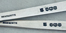 Load image into Gallery viewer, Pair of Celtic Design sterling spoons, Cooper Brothers &amp; Sons Ltd, Sheffield, 1962