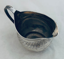 Load image into Gallery viewer, Georgian bright-cut sterling milk jug, London, 1809