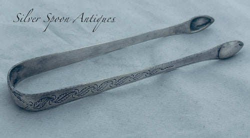 Rare pair of English provincial sterling sugar tongs, Nathaniel Smith & Co, Sheffield, 1801