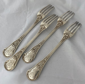 Set of four French silver Neo-Roccoco Table Forks, 1830s-40s