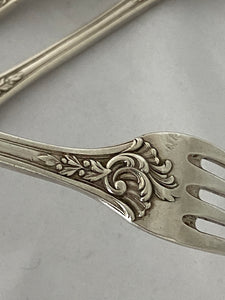 Set of four French silver Neo-Roccoco Table Forks, 1830s-40s